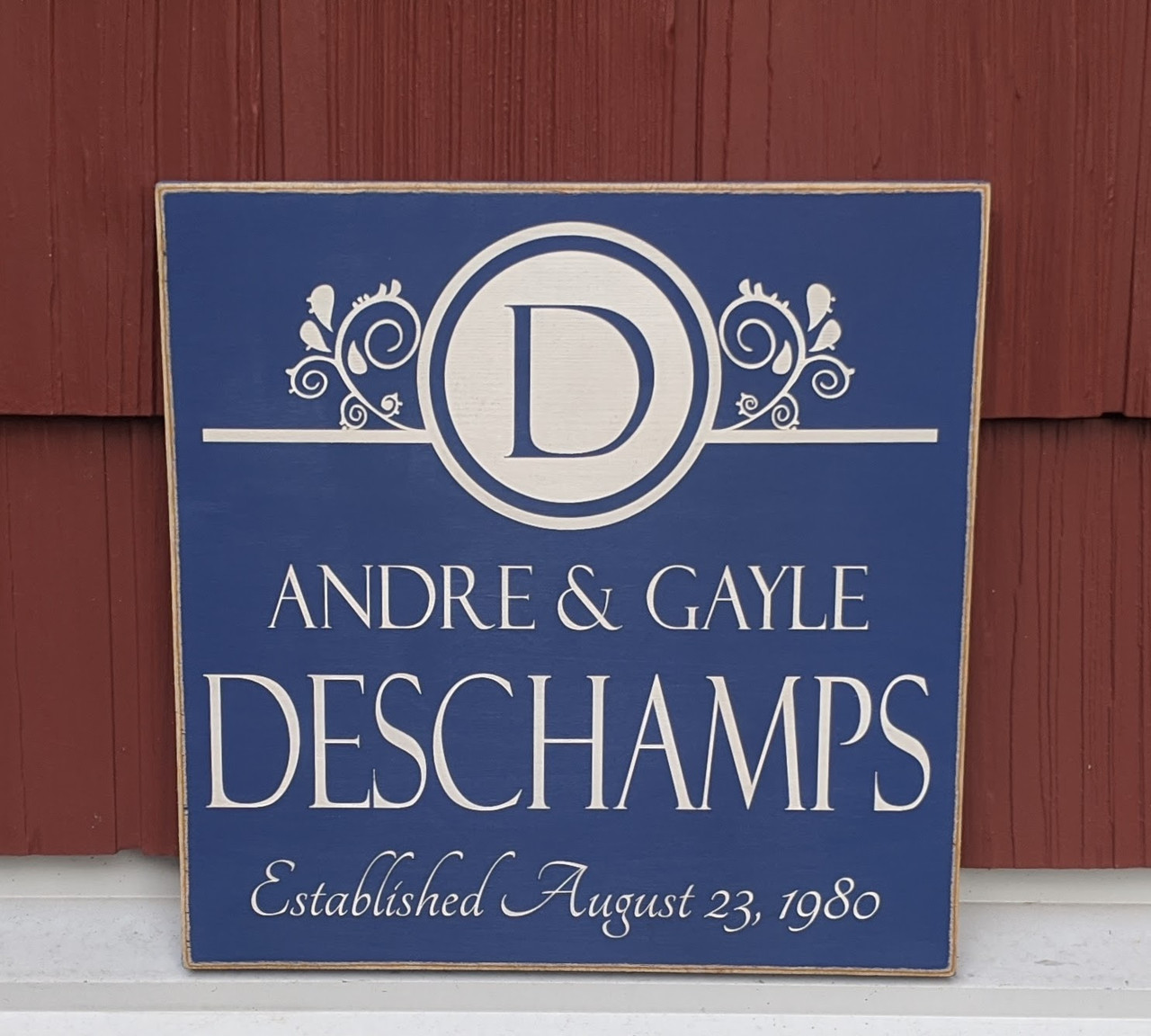 family monogram with establishment wood sign