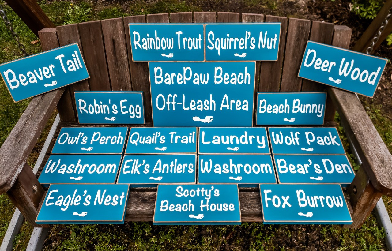 Barefoot Beach resort signs