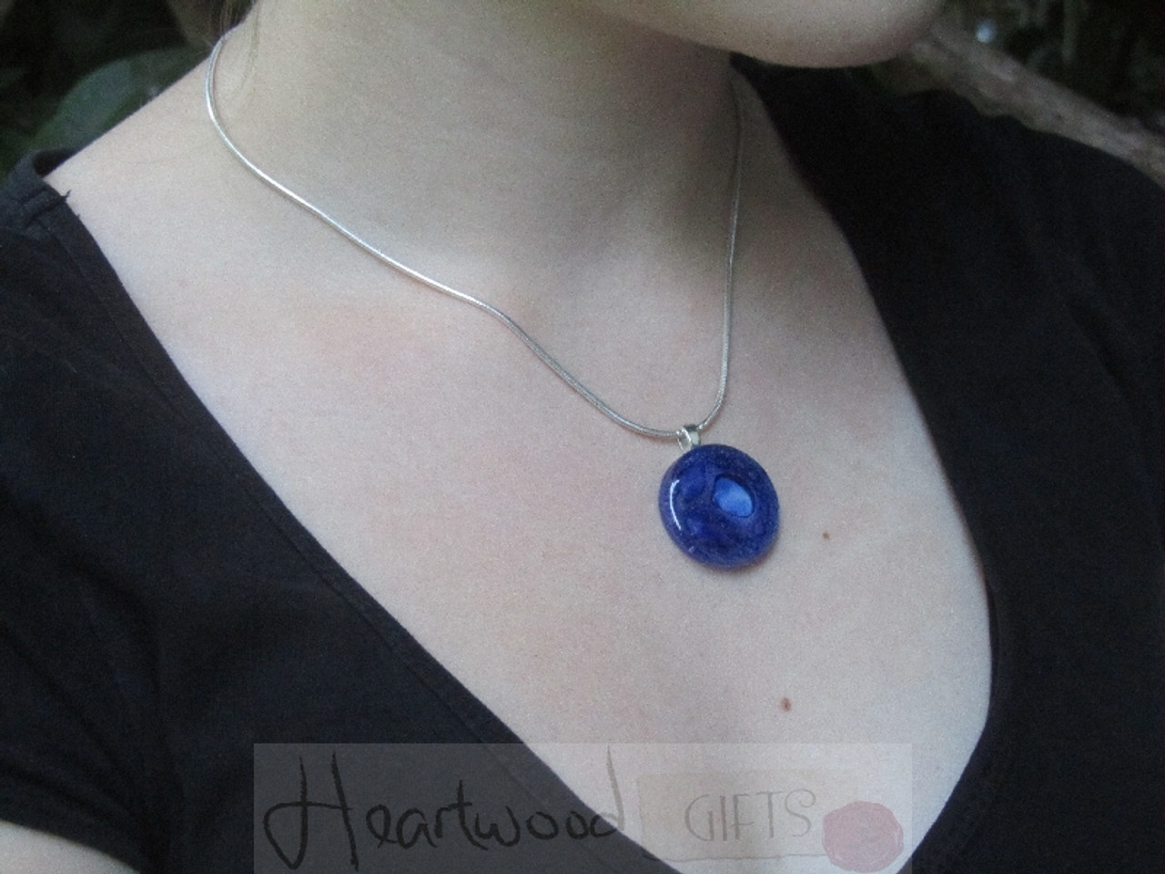 Model with Momo Glassworks Cobalt Blue Medallion