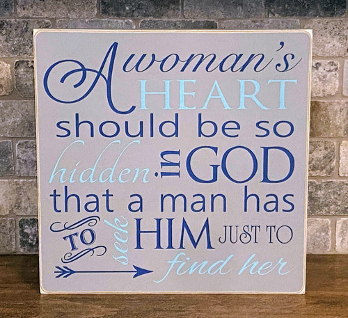 Handmade wood signs that reads, "A woman's heart should be so hidden in God that a man has to seek Him just to find her"