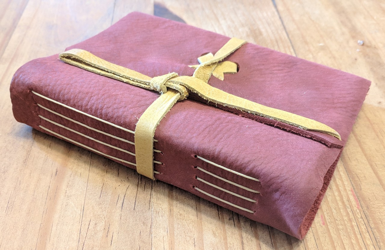 side view off spellbinding journals - small red side view off spellbinding journals - small red