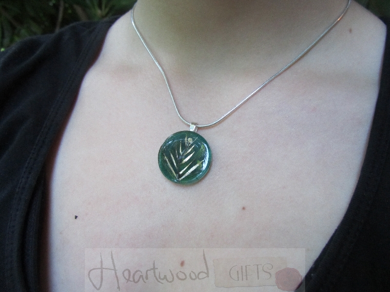 Model with Momo Glassworks Leaf Glass Medallion