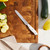 Henckels Forged Accent 5-inch Serrated Utility Knife - White Handle