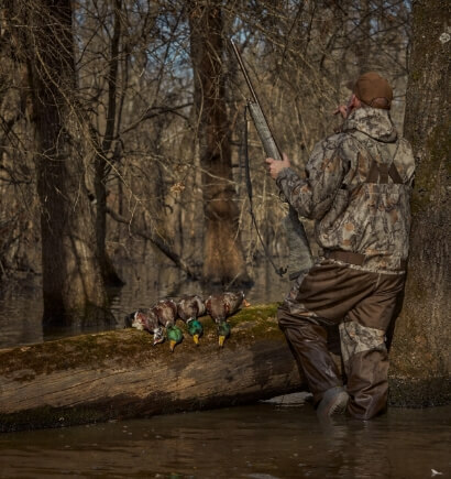 Duck hunter wearing waders