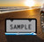 Black Plastic License Frame with 3D Bronco Script Emblem _  Blue Waves Design 
