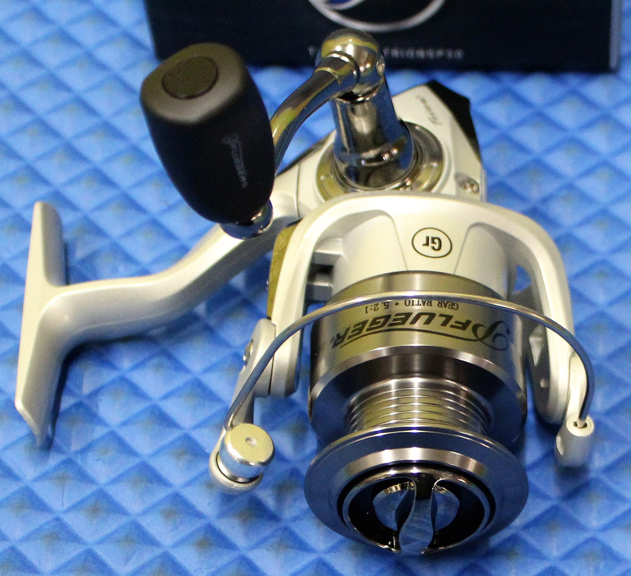 Just picked a Pflueger Trion on  for 37.74. picture of it below. I