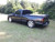 2003 GMC Sierra - McGaughys 5/7 Deluxe Drop Kit With 1" Lowering Shackles, 20" Factory Wheels, 245/50R20 Front, 265/50R20 Rear