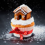 mini 3d gingerbread house used as a cupcake topper