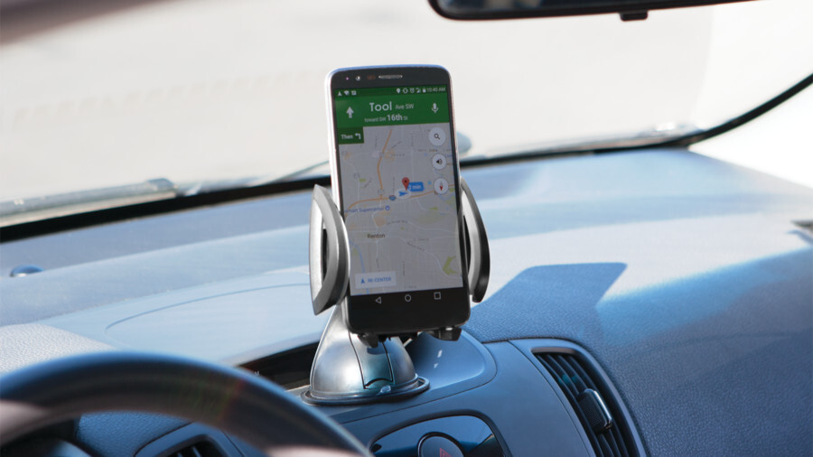 Performance Tool mobile electronics featuring an image of a phone holder on a car dashboard