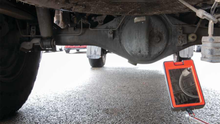 Performance Tool inspection mirrors, featuring an image of an inspection mirror underneath the chassis of a vehicle looking up
