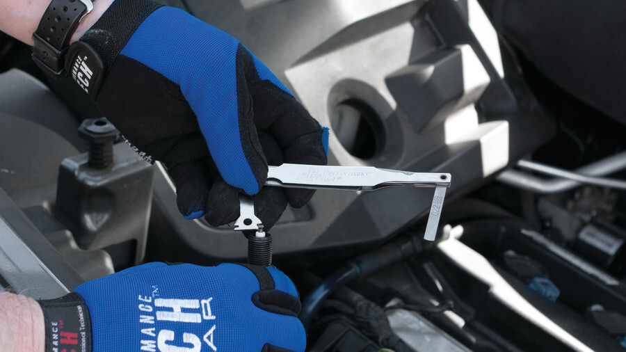 Performance Tool Feel gauges, showcasing an image of feeler gauges measuring a spark plug in an engine bay.