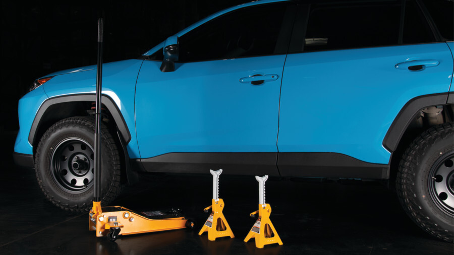 Performance Tool Floor Jacks, featuring a floor jack and jack stands next to a car.