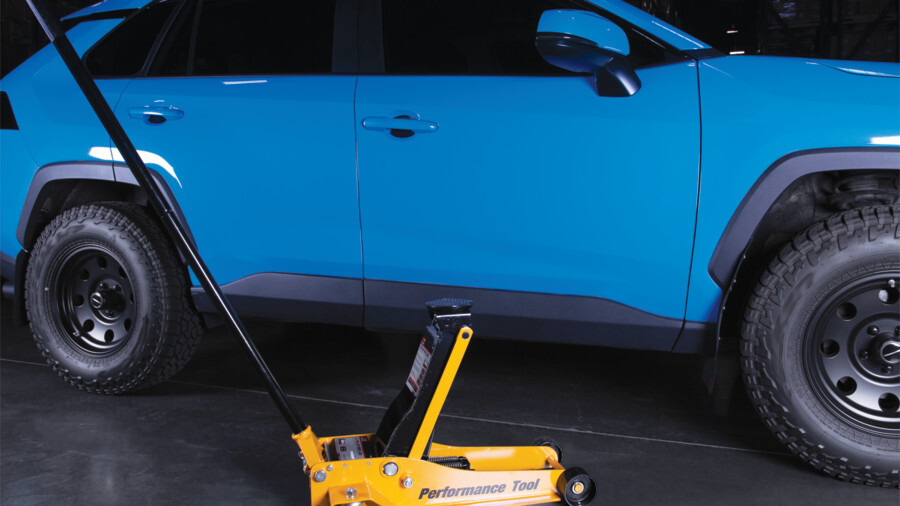 Performance Tool floor jacks featuring an image of ab extended 3.5 ton floor jack in front of an SUV