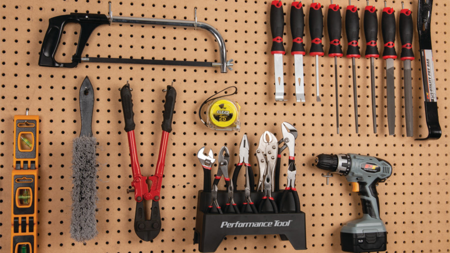 Performance Tool Pliers and Cutters featuring an image of a number of files, bolt cutters, hand tools, and saws all on a tool board.
