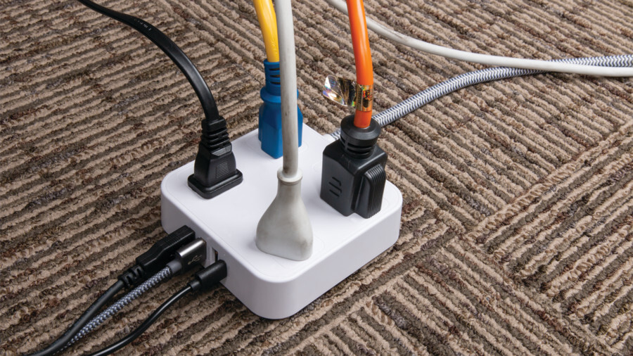 Performance Tool extension cords, featuring an image of extension cords plugged into a 4 prong and USB power block