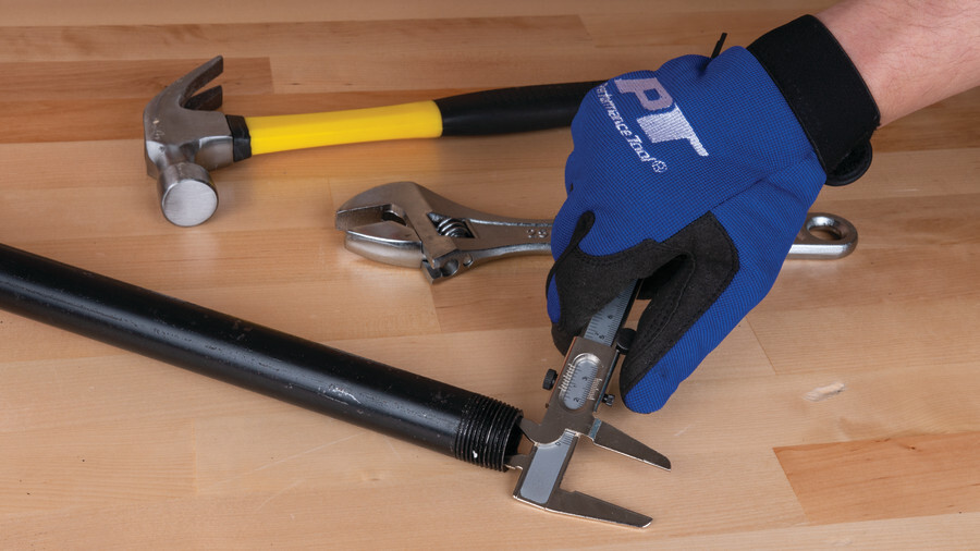 Performance Tool calipers featuring an image of calipers in use to measure the diameter of a threaded pipe on a table