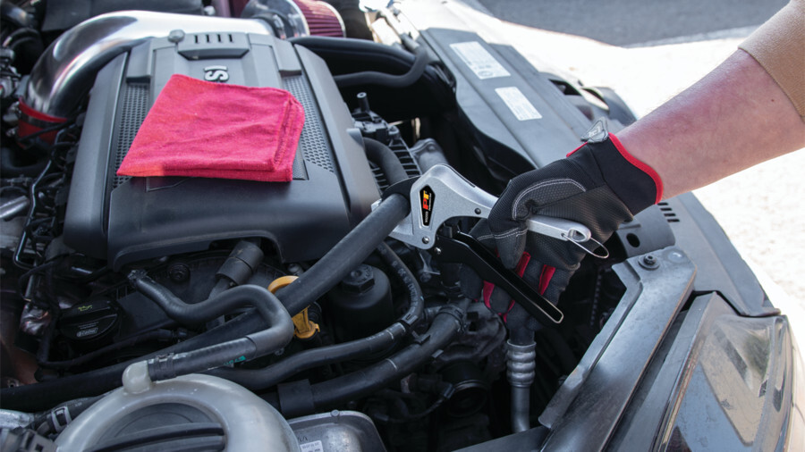 Performance Tool crimpers and strippers featuring an image of a pipe cutter being used on an engine bay hose.