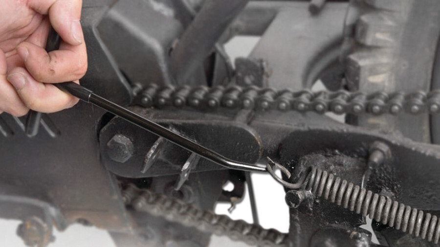 Performance Tool Drum Brake Tools, featuring a brake spring hook spreading the spring on a drum brake.