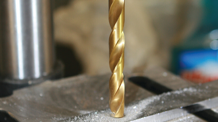 Performance Tool power tool drill bit sets featuring an image of a drill bit burrowing into a metal base