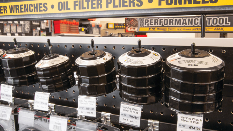 Performance Tool display hooks featuring a retail display of oil filter wrenches on hooks.