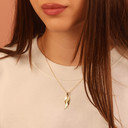 Yellow Gold Angel Wing Necklace on female model