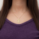 Yellow Gold Custom Cubic Zirconia Patron Saint Round Pendant Necklace on Female model
