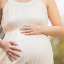 .925 Sterling Silver Personalized Lab Created Clear Birthstone Wavy Band Ring on female model