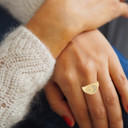 Yellow Gold Diamond Islam Crescent and Star Signet Ring on a Female Model