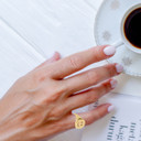 Gold Happy Smiley Face Emoji Signet Ring on female model