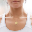 Gold Bear Pendant Necklace on female model