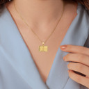 Yellow Gold English Open Bible Pendant Necklace on Female Model