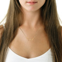 14K Gold Openwork Angel Wings Outline Necklace on female model