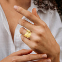 Gold Ribbed Cocktail Party Striped Band Ring on female model