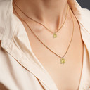 Yellow Gold CZ Studded Sea Turtle Pendant Necklace on female model