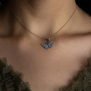 .925 Sterling Silver Diamond Cut Butterfly Charm Pendant Necklace on female model