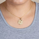 Gold Spiritual Symbols Faith Medallion Pendant Necklace on female model