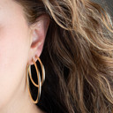 3mm 14K Yellow Gold Hoop Earrings medium and large on female model