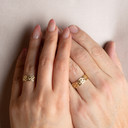 Gold Unisex Eternity Wedding Band Ring Set on male and female model