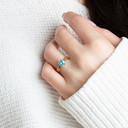 Yellow Gold Genuine Round Gemstone Trinity Knot Claddagh Ring on female model