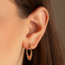 Tri-Color Gold Heart Hoop Earrings on female model