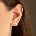 Yellow Gold Diamond Cut Fish Ocean Stud Earrings on female model