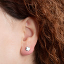 .925 Sterling Silver Lucky Irish 4 Leaf Clover Stud Earrings on female model