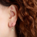 Yellow Gold Marine Octopus Ocean Drop Huggie Hoop Earrings on female model