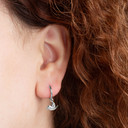 .925 Sterling Silver Bird Dove Drop Huggie Hoop Earrings on female model