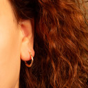 Tri-Color Gold Beaded Twist Hoop Earrings on female model