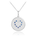 Heart disc pendant necklace with diamonds and sapphire in 14k white gold.