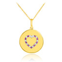 Heart disc pendant necklace with diamonds and rubies in 14k gold.