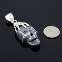 Two-Tone Black Silver Skull and Hand Pendant