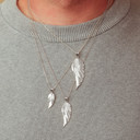 Silver Angel Wing Necklace on male model
