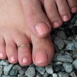 Yellow Gold Woman's Charming Heart Shaped Toe Ring on female model